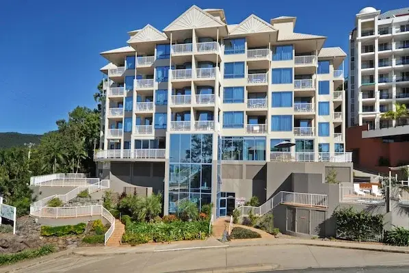 at Whitsunday Vista apartment building with balconies and landscaped entrance