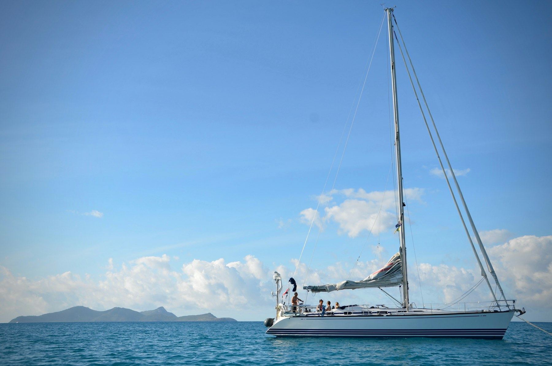A family sailing yacht anchored near Whitehaven Beach in the Whitsundays